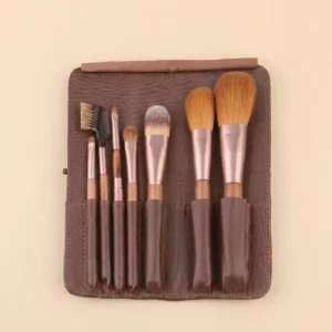 7-piece luxury natural hair makeup brush set with rose gold ferrules and brown suede clutch
